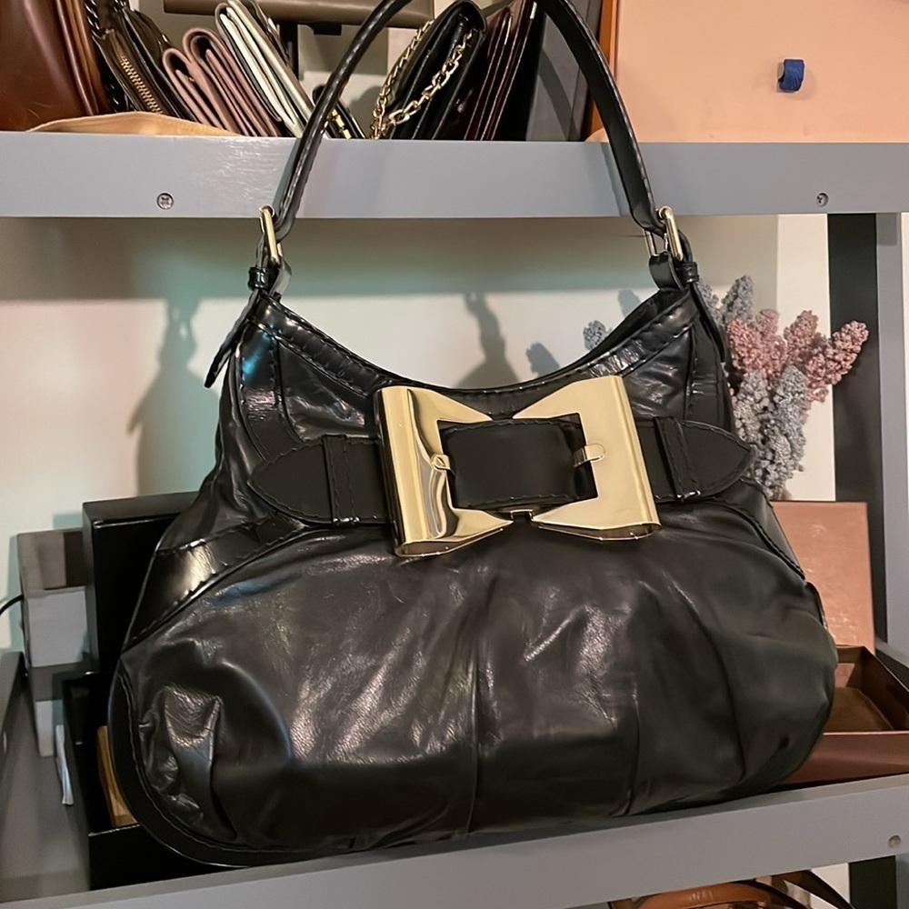 Gucci Black Leather Shoulder Bag with Gold Bow Accent